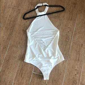 White backless body suit